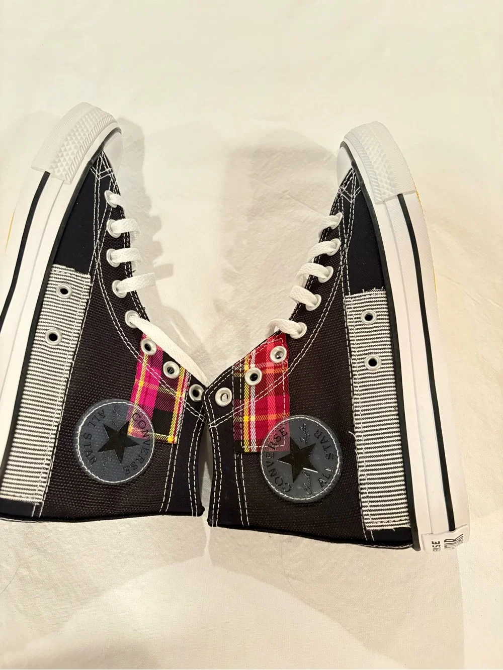 Converse Black High-Top Sneakers with Red Plaid Accent